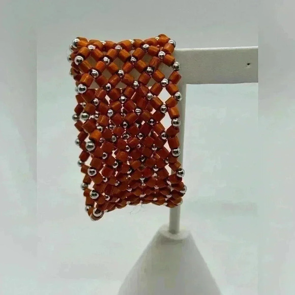 ♦️. Fun stretchy orange/rust colored bracelet - Picture 1 of 3